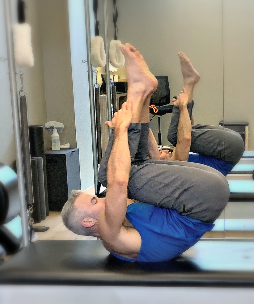 Man doing tumbling calisthenics for improved strength and conditioning.