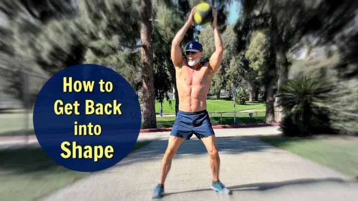 Fit, 53 year-old man exercising at park with balll.
