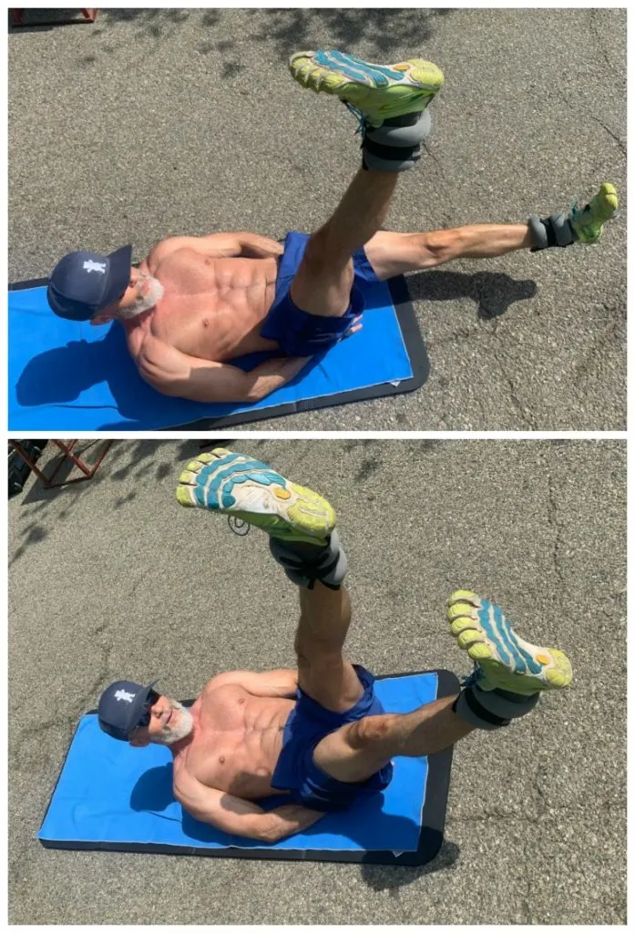 Older athlete doing ab workout with ankle weights.