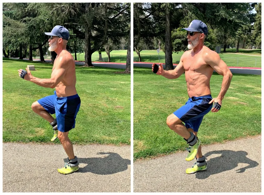 53 year-old athlete does high-knees exercise in park wearing ankle weights.