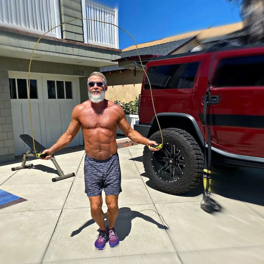 CrossFit for Over 50 – Older athlete does high intensity interval training in his driveway.