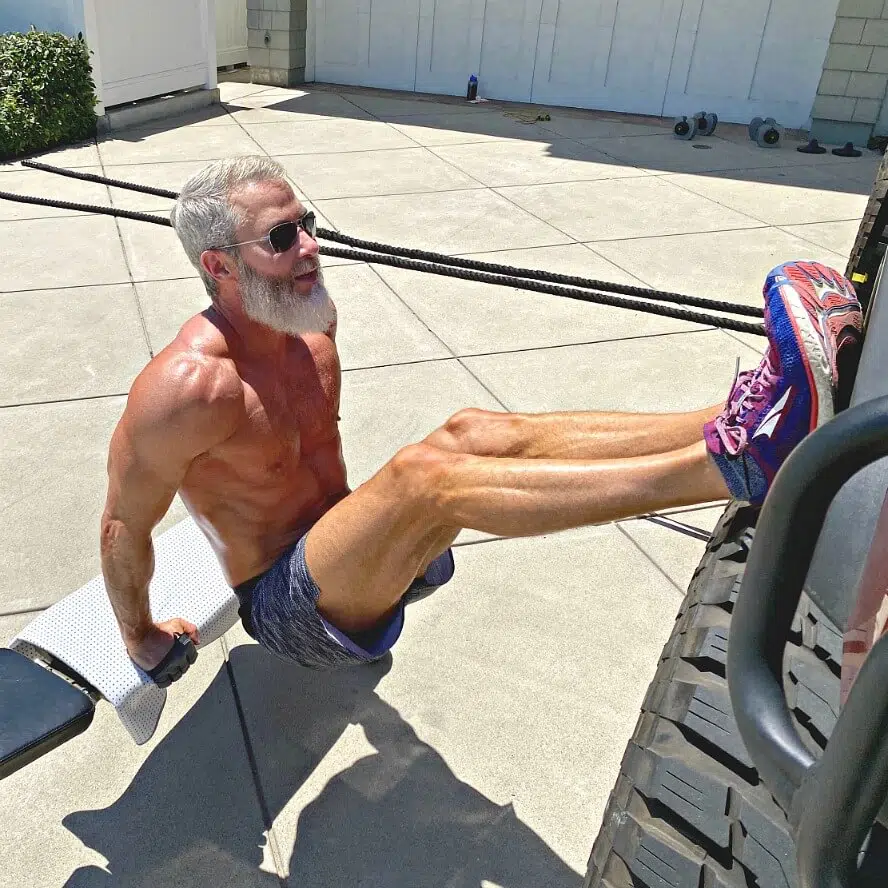 man exercising in his driveway