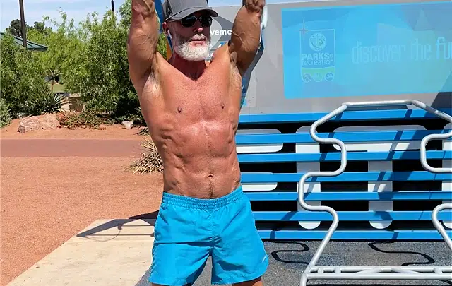 mature man age 55 healthy and fit with kettlebells