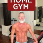 Mature, fit athlete training in his home gym.