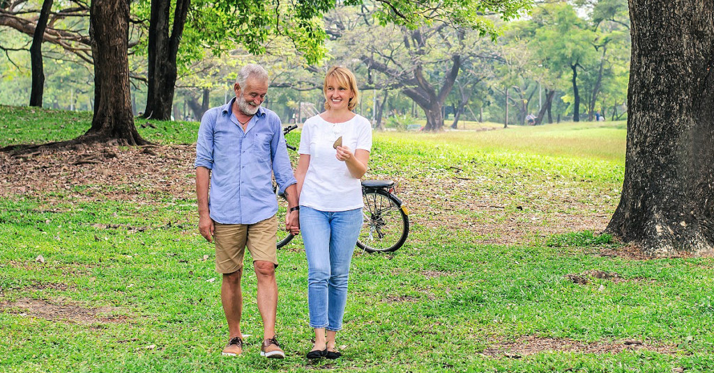 aging couple enjoying outdoors after improving bone health