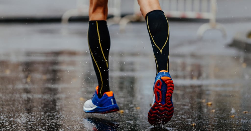 wearing compression socks can help with bulging varicose veins