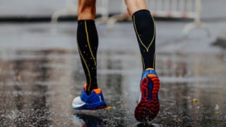 wearing compression socks can help with bulging varicose veins
