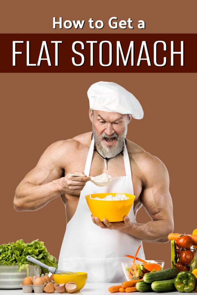 Mature fit man creating a flat stomach by eating healthy diet.